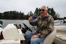 That channel marker work sure makes a guy thirsty - Lloyd Richmond, committee chair, toasts the group as a fitting reward for volunteering your time and resources. - Click to enlarge.